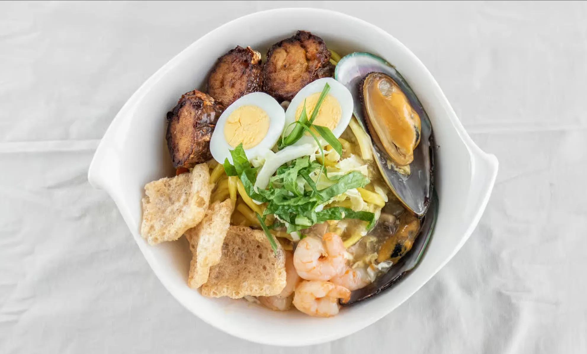 Famous Lomi Overload soup at Juvian's Restaurant Waterford in Winnipeg, MB